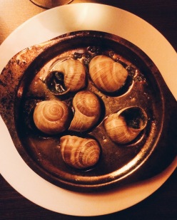 Escargots, cooked in a delicious garlic/parsley/butter sauce